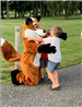 Children in front of fox mascot