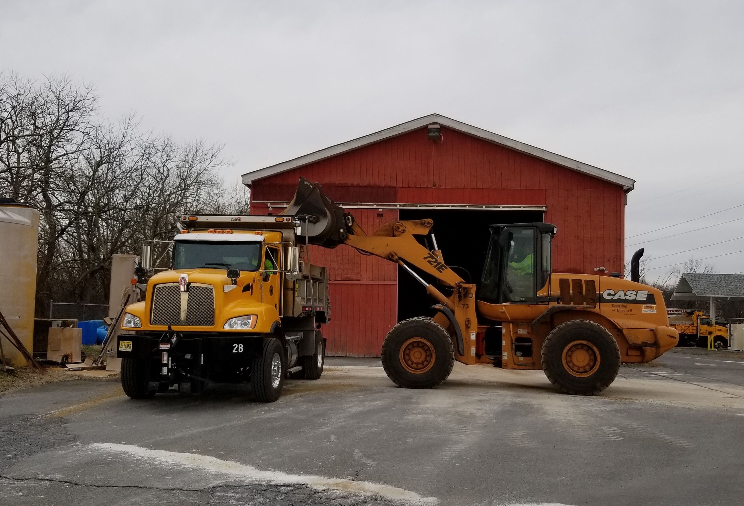 Truck being filled with salt in preparation for a snow storm