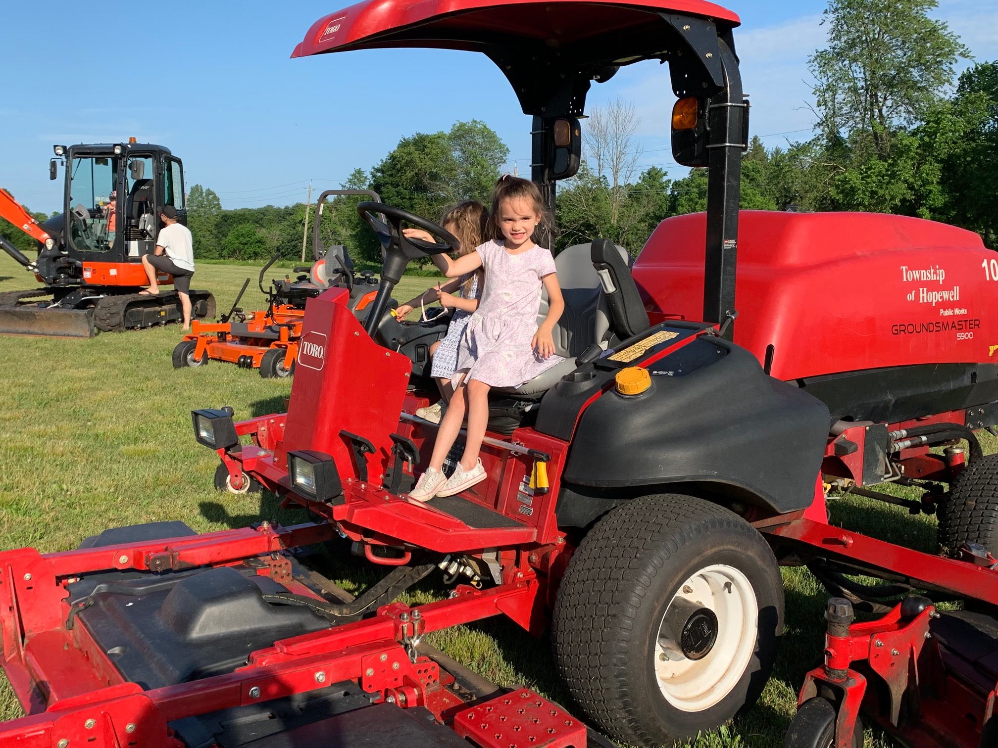 girl driving a tractor