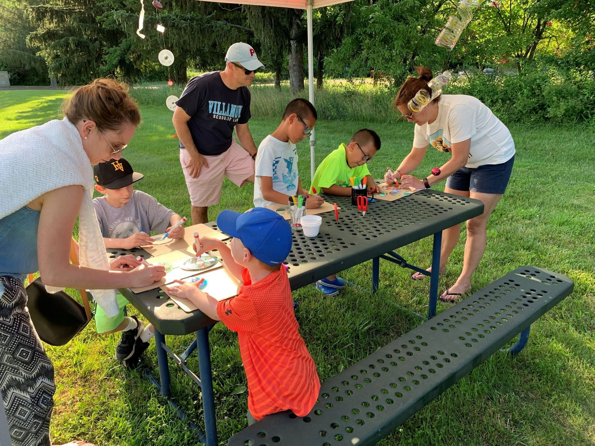 Come Out and Play 35 - children with parents at picnic table doing art project