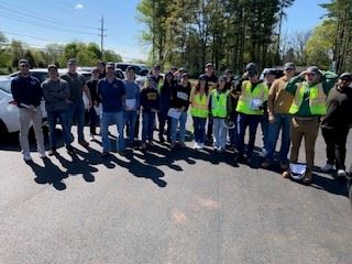 TCNJ students in safety vests visiting construction site