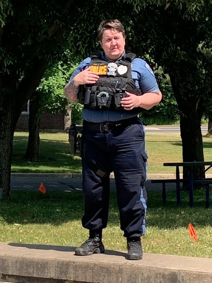 Sergeant Alexis Mirra in uniform, speaking