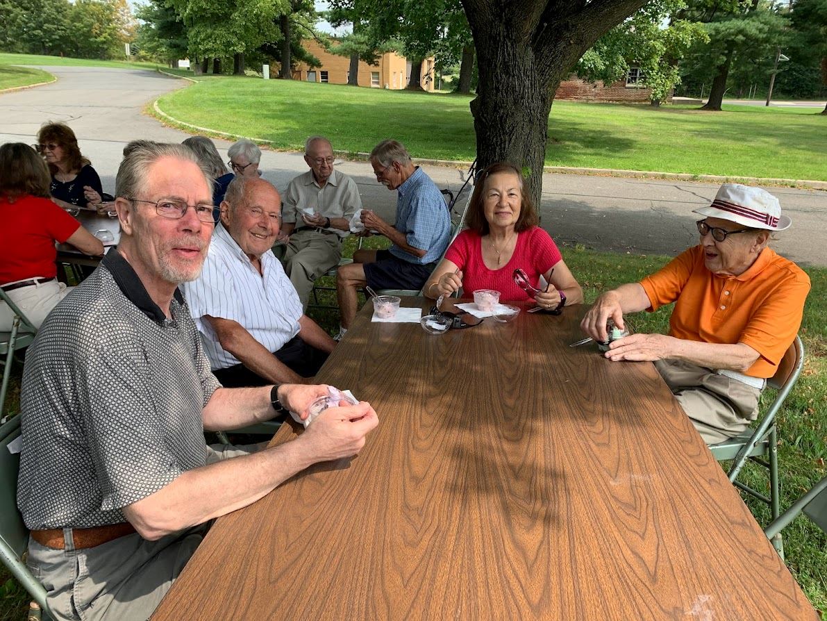 Seniors celebrating senior citizens day with ice cream