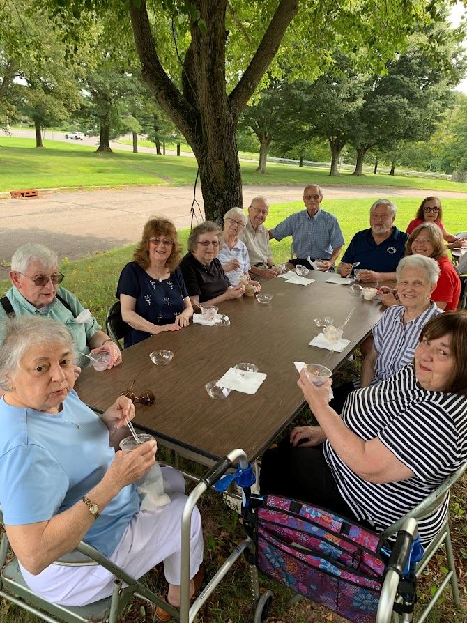 Seniors celebrating senior citizens day with ice cream